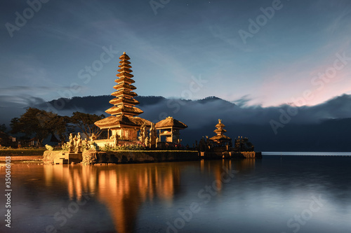 Ancient temple illumination of Pura Ulun Danu Bratan with blue sky on the dawn at Bali