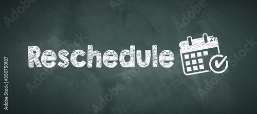 blackboard with message RESCHEDULE