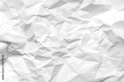 White crumpled paper texture background. Clean white paper. Top view.