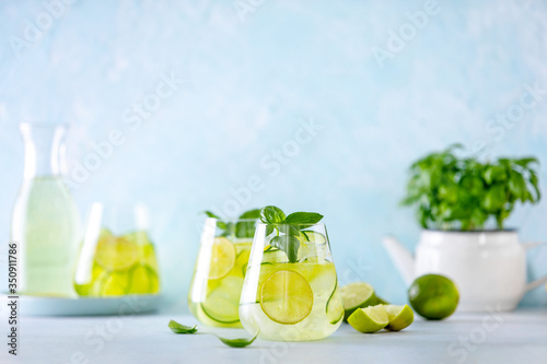 Cucumber and basil gin and tonic cocktail in glasses