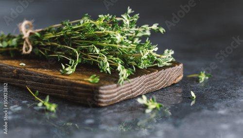 Close up view of thyme bunch. Herb thyme on table