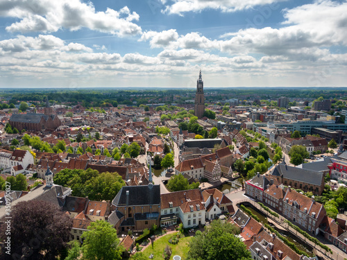 Panoramic aerial of the city center of Amersfoort, the Netherlands, on a sunny day with white clouds