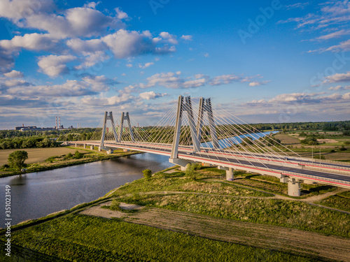 Bridge of Cardinal Franciszek Macharski in Krakow at sunset.