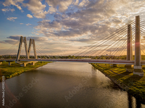 Bridge of Cardinal Franciszek Macharski in Krakow at sunset.