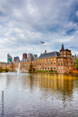 Binnenhof Palace of Parliament inThe Hague in The Netherlands At Daytime. Against Modern Skyscrapers on Background.