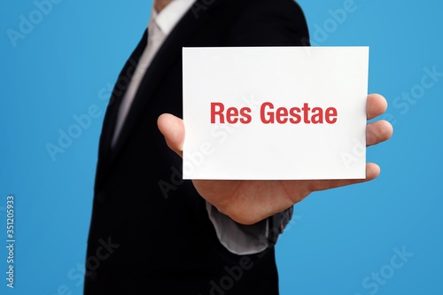 Res Gestae. Businessman (Man) holding a card in his hand. Text on the board presents term. Blue background. Business, Finance, Statistics, Analysis, Economy