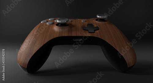 Wood video game controller isolated on darkness background 