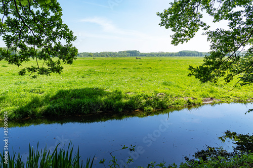 Behind this ditch are the green meadows that surround the royal estate De Horsten in Wassenaar, the Netherlands