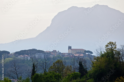 ypical country of southern Italy. Montefredane, Avellino, Irpinia, Campania, Italy. The castle of Montefredane with the mount of Chiusano on the background.