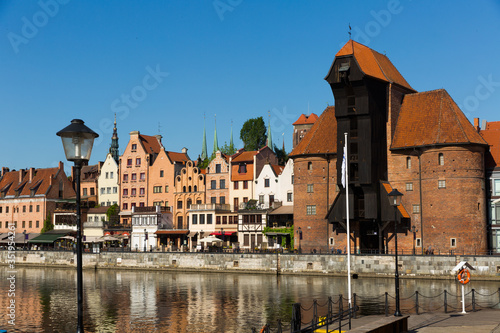 Motlawa river embankment in historical part of Gdansk at sunny day