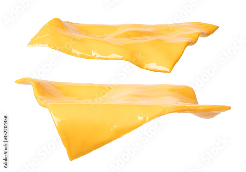 pieces of cheddar cheese on a white background
