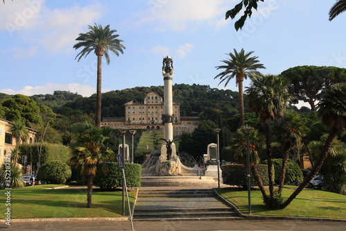 Monument in palms garden view. Italian city Frascaty park