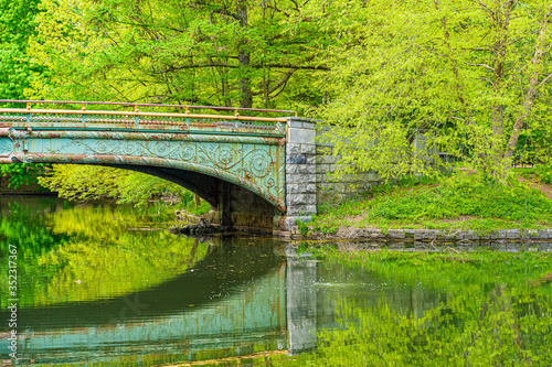 Prospect park, Brooklyn NY May 11, 2020, Brooklyn, New York City. People Keeping Their Social Distance, Because Of The Covid19 Pandemic, Sunday, Lullwater Bridge, Prospect Park, reflection in water ou