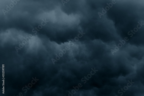 Stormy rain big fluffy clouds. Dark sky. Natural scenic abstract background. Weather changes backdrop. Sky filled with voluminous clouds.