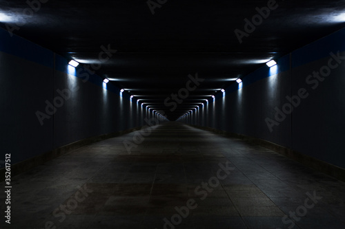 Photo of endless tunnel made by Balahibo Dawid Gierak. With passion to city at night.