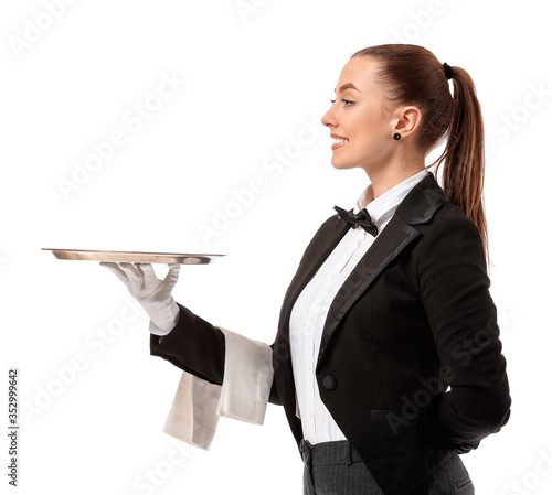 Beautiful female waiter on white background