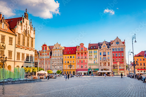 Stunning morning cityscape of Wroclaw, historical capital of Silesia with beautiful old houses, Poland, Europe. Wonderful summer view of Market Square. Traveling concept background..