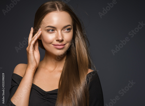 Beautiful smooth long hair woman natural make up face portrait beauty