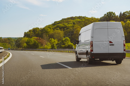 fast vans traveling on the highway