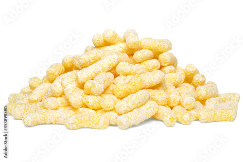 A heap of corn snacks. Sweet sticks of puffcorn