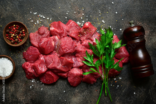Raw organic meat ( beef or lamb ) . Top view with copy space.
