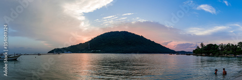 Beautiful sunset over Malaysian island Perhentian Besar with red clouds
