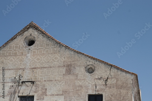 The pretty village of Frigiliana in southern Spain. The old palace of the Counts, El Ingenio. This beautiful old building is now used as a place to produce syrup from sugar cane.