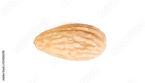 A single blanched almond seed isolated on white background. Diet food