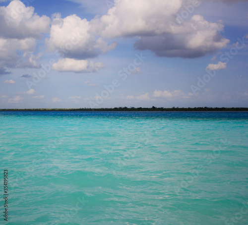 The Bacalar lake is renowned for its striking blue color shades and water clarity