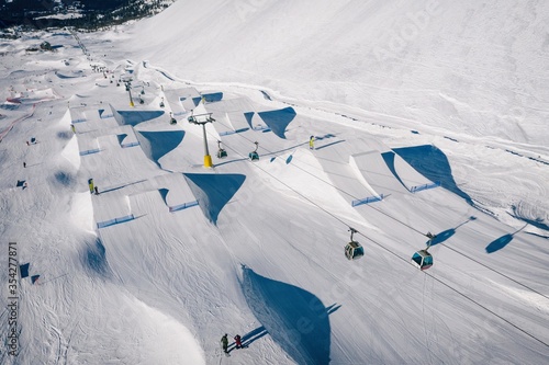 Aerial drone view of Madonna di Campiglio and ursus snowpark in Val Rendena dolomites Italy