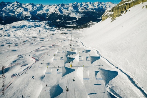 Aerial drone view of Madonna di Campiglio and ursus snowpark in Val Rendena dolomites Italy