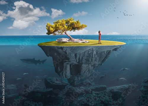 Desolate island with lone girl as freedom concept