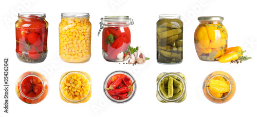 Set of jars with pickled vegetables on white background. Banner design