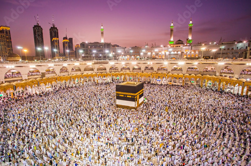 Muslim pilgrims from all around the world doing tawaf, praying around the kabah in Masjidil Haram, Mecca Saudi Arabia, during hajj and umra.