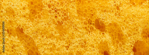 banner of macro yellow polyurethane foam rubber washcloth sponge