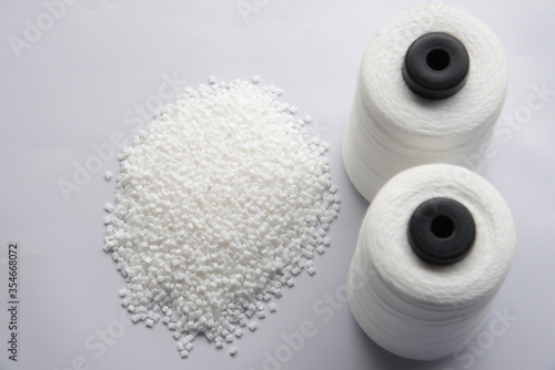White Pet Chips Semi Dull,PET chips recycle,PET polyester chips &Raw White Polyester FDY Yarn spool with white background