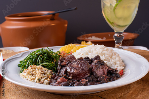 Typical Brazilian dish called Feijoada. Made with black beans, pork and sausage