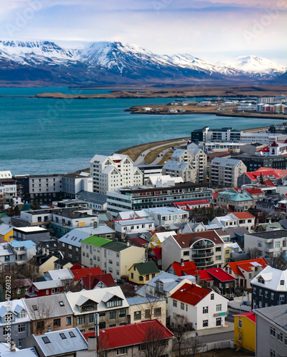 View of Reykjavik, capital of Iceland, as seen from Hallgrimskirkja, with Mount Esja in the background. 