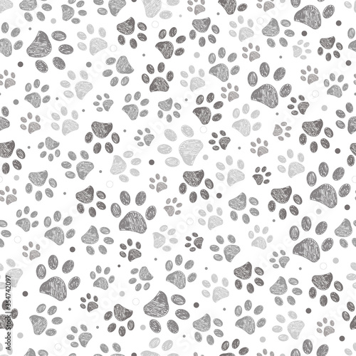 Doodle grey paw print seamless fabric design repeated pattern with grey background