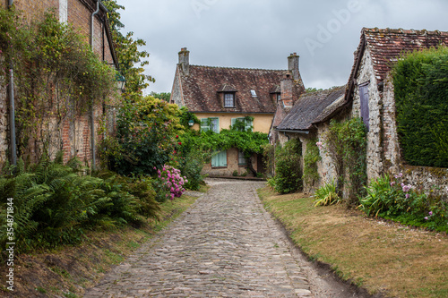 Picturesque European country house in summer. Traditional French village