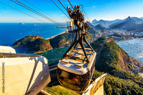Sugar Loaf Mountain Cable Car Overlooking Christ The Redeemer Statue in Corcovado Mountain, Rio de Janeiro - Brazil