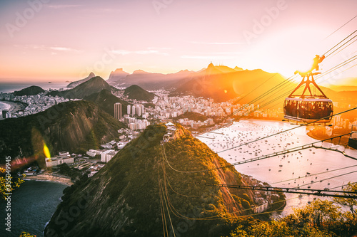 Sugar Loaf Mountain Cable Car Overlooking Christ The Redeemer Statue in Corcovado Mountain and Guanabara Bay, Rio de Janeiro - Brazil