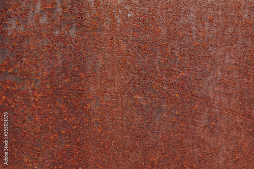Deep Red Rusty iron or steel texture and surface. Vintage and industrial concept, Rust on metal material with scratch and bumpy surface. 