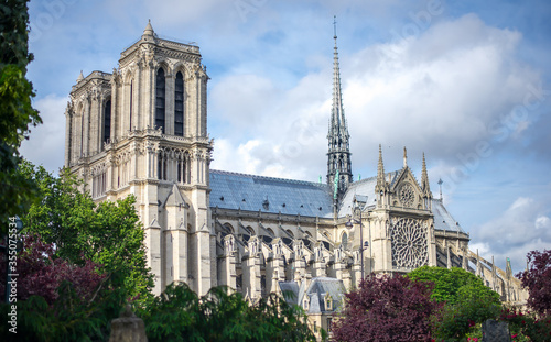 Notre Dame de Paris in a beautiful summer day. View from a side.