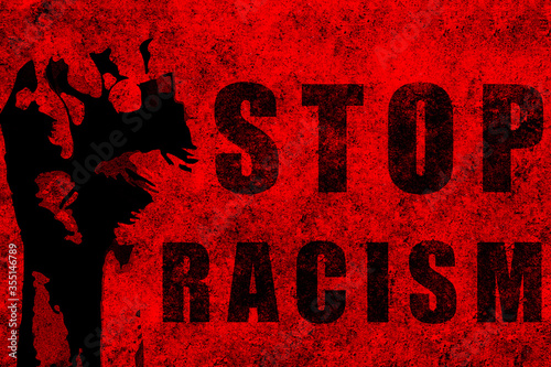 Stop racism. Red fist raised with a powerful anti-racist message.