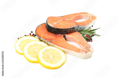 Fresh raw salmon meat and spices isolated on white background