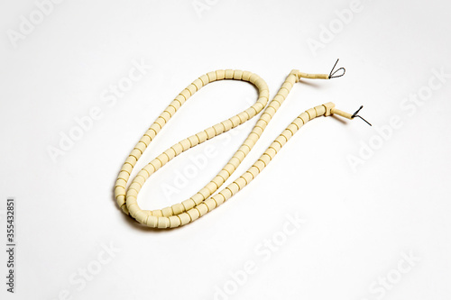Ceramic coated heating coil isolated on white background. High-resolution photo.