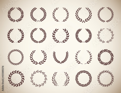 Set of different vintage silhouette circular laurel foliate and olive wreaths depicting an award, achievement, heraldry, nobility. Vector illustration.