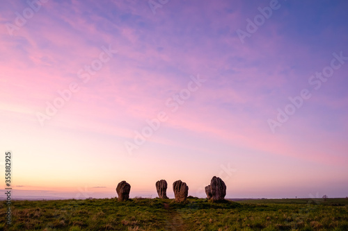 Duddo Stone Circle - Northumberland at sunset with purple sky