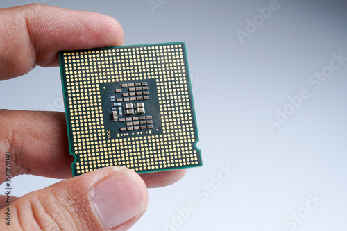 Close-up of modern CPU Chip Processor for tech science background. Selective Focus. 